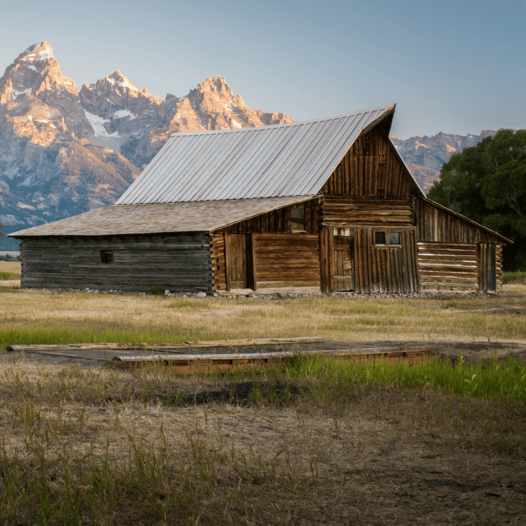old rustic pole barn in mountains